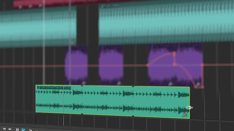 Acid Pro timeline with an Old School Dance Drums loop being dragged into place beneath teal and purple audio tracks with an automation curve.