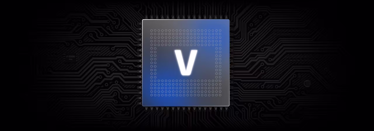 Close-up of a blue glowing microchip with a white letter V in the center on a black circuit board background.