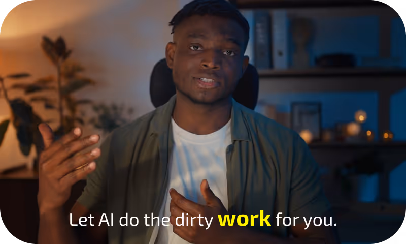 Man gesturing with both hands speaking in a dimly lit room with text saying "Let AI do the dirty work for you," highlighting the word "work" in yellow.