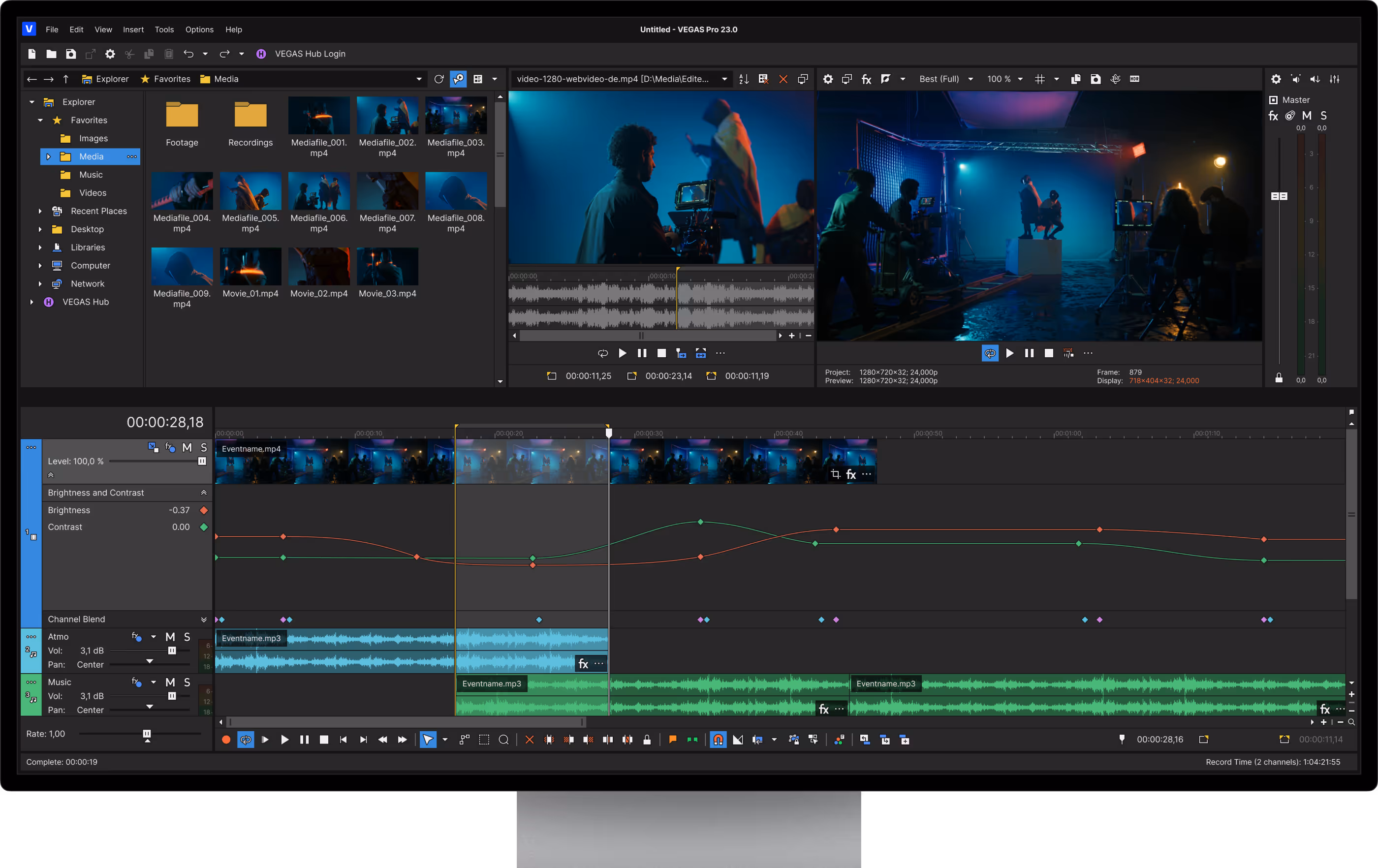 Computer screen showing VEGAS Pro 23.0 video editing software with media files, preview windows, and timeline with video and audio tracks.